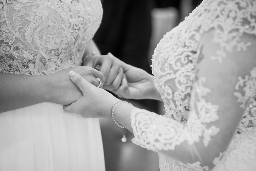 Love beyond tradition: Bolton brides say "I do" in heartfelt ceremony captured by Michael Pardoe Photography.