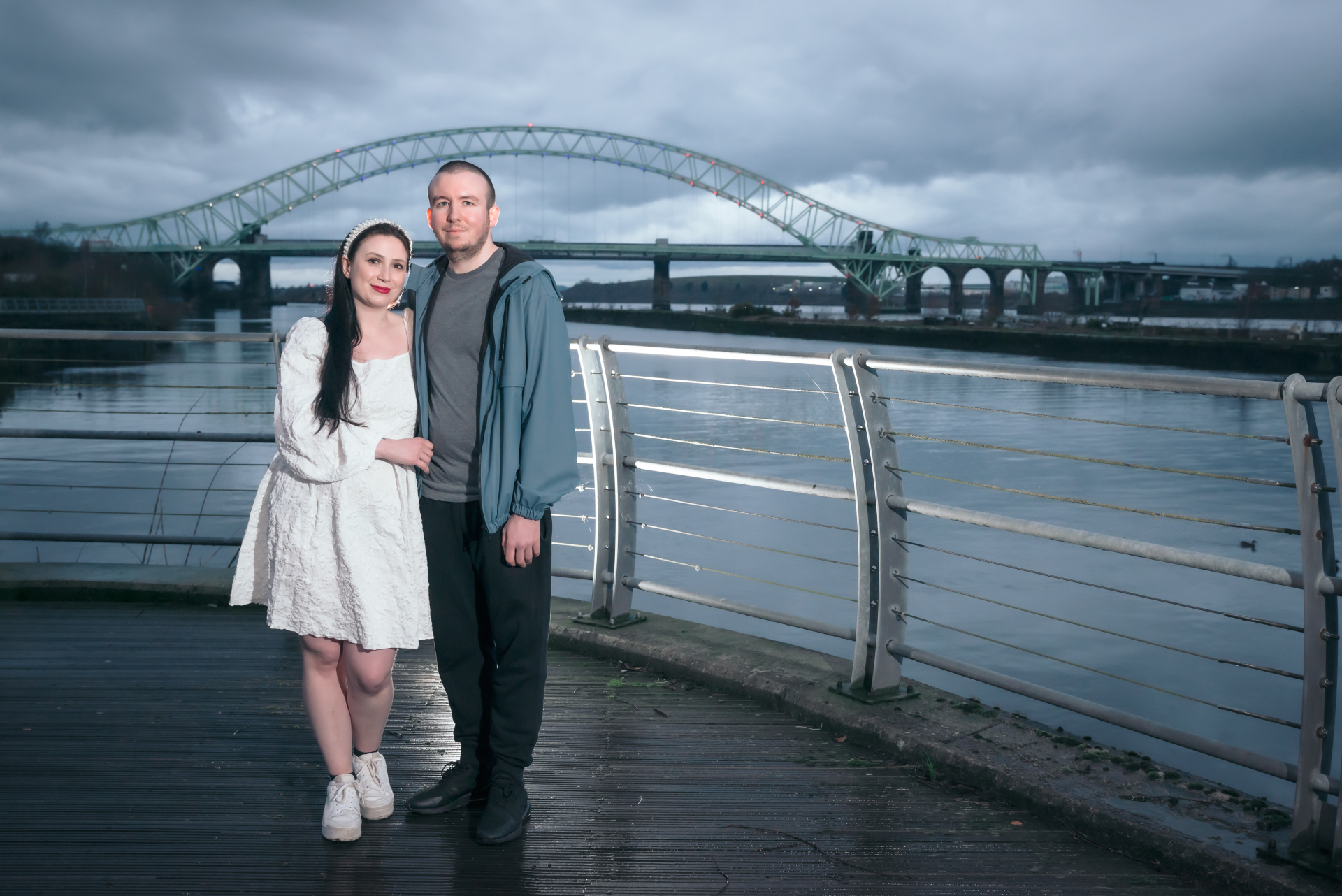 bride to be stood next to her husband to be during a pre wedding photo shoot in Runcorn