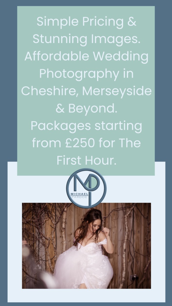 a woman in a wedding dress dancing in a barn at Cheshire Woodland Weddings | Photography by Michael Pardoe