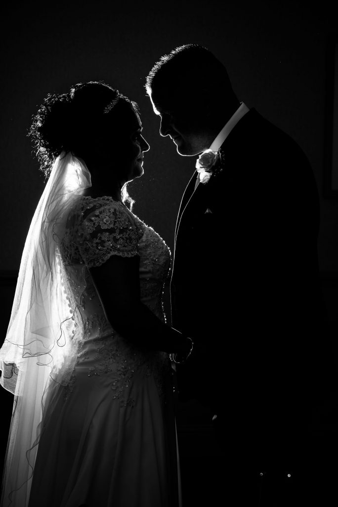 black and white silhouette wedding photograph taken at Wynnstay Arms Ruabon, Wales by Michael Pardoe | Affordable Wedding Photography Prices | Wedding Photographer